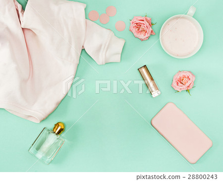 Coffee and personal items on desktop 28800243