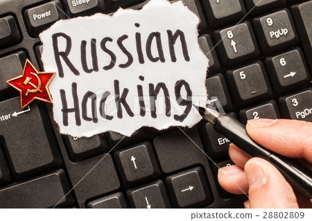 Russian hacking, inscription on torn paper sheet Russian hacking, inscription on torn paper sheet 28802809