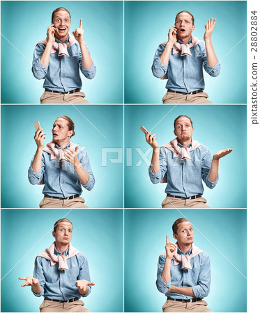The surprised young man over blue background 28802884