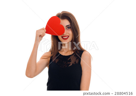 charming girl in black dress smiles and keeps the charming girl in black dress smiles and keeps the 28804516