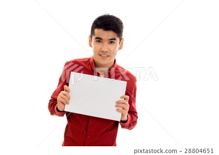 stylish young brunette man posing with empty 28804651