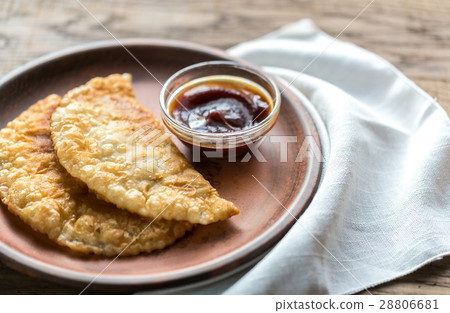 Meat patties on the plate 28806681