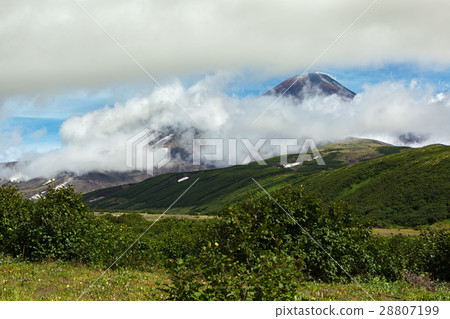 Avacha Volcano or Avachinskaya Sopka in the clouds Avacha Volcano or Avachinskaya Sopka in the clouds 28807199