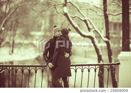 loving couple walking in the city view from the back 28808009