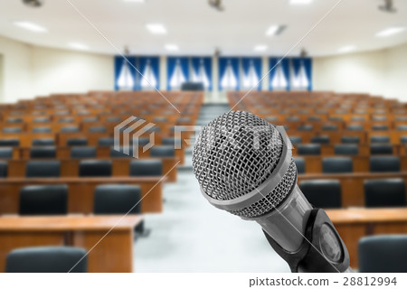 Microphone with empty conference hall or seminar Microphone with empty conference hall or seminar 28812994