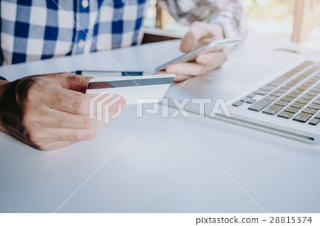 Businessman hand using smart phone Businessman hand using smart phone 28815374