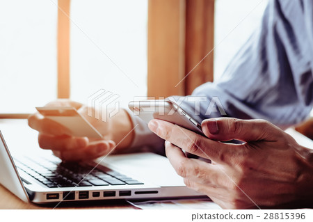Man hand using smart phone Man hand using smart phone 28815396