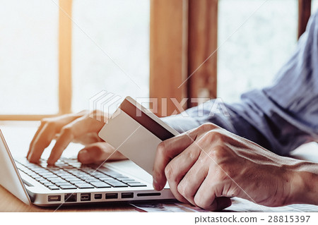 man hands holding a credit card man hands holding a credit card 28815397