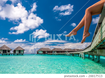Woman at beach jetty 28817513