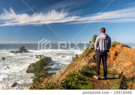 Lone man at USA Pacific coast landscape 28818088