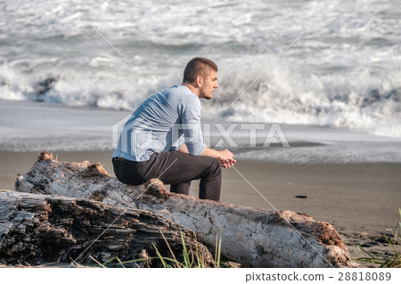 Lone man at USA Pacific coast beach Lone man at USA Pacific coast beach 28818089