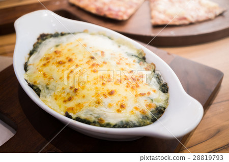 Baked spinach with cheese 28819793