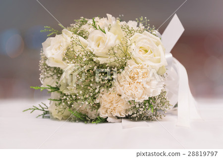 Bridal bouquet of white rose on blur background 28819797