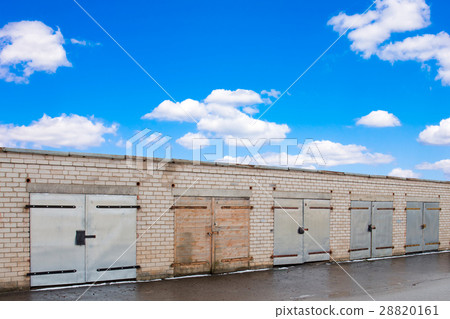 Garage doors under a blue sky Garage doors under a blue sky 28820161