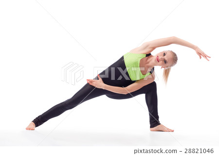 Attractive female gymnast exercising at studio  28821046