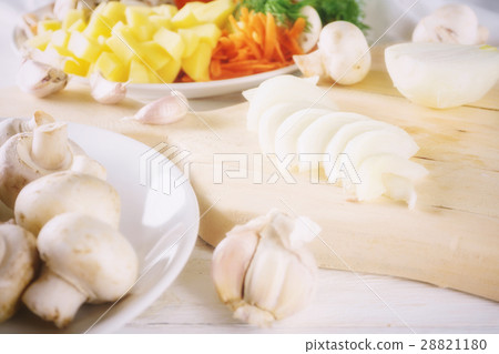 chopped onion and ingredients for soup 28821180