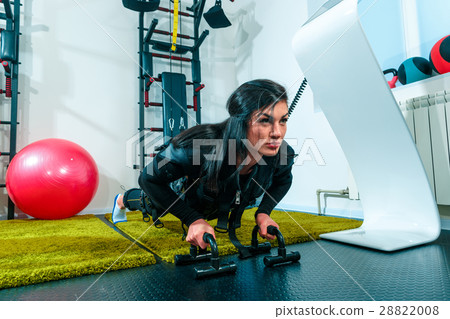 The female athlete doing they exercise in a ems 28822008