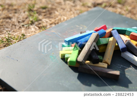 Chalkboard and chalk 28822453