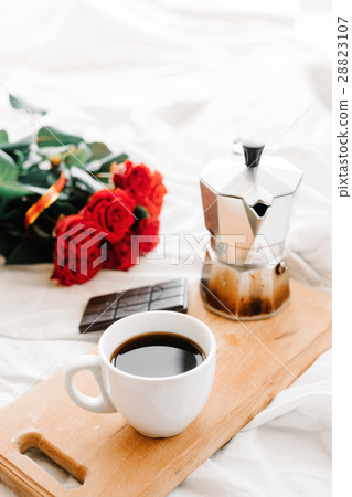 A cup of coffee, coffee on the wooden Boards, a A cup of coffee, coffee on the wooden Boards, a 28823107