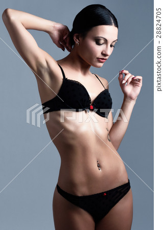 Beautiful brunette girl, model of fashion, wearing black underwe Beautiful brunette girl, model of fashion, wearing black underwe 28824705