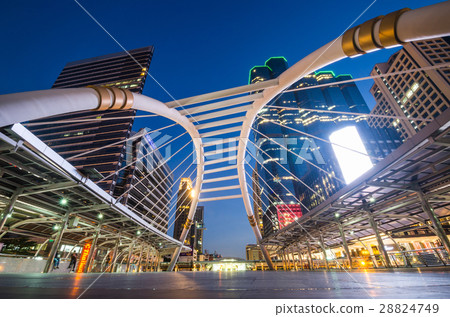 Twilight buildings and traffic in business area 28824749