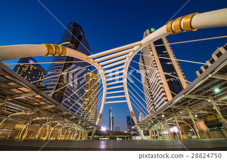 Twilight buildings and traffic in business area 28824750