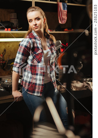 Attractive girl standing on background Attractive girl standing on background 28825103