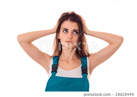 a young girl looks away and kept her hands behind a young girl looks away and kept her hands behind 28828449