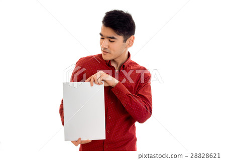 a young guy in a red shirt holding a white sheet 28828621