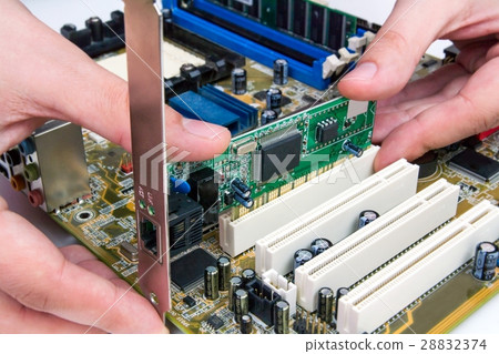 Man installing LAN networdk adapter into PC 28832374