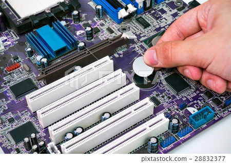 Hand install battery to PC motherboard 28832377