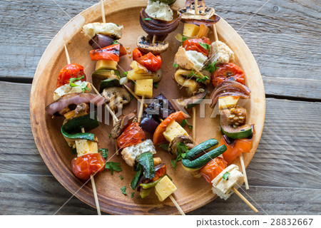 Grilled vegetable skewers on the plate 28832667