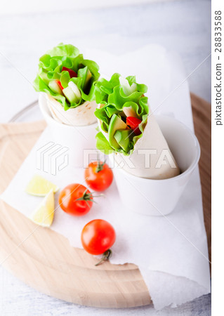Vegetable wrap sandwiches 28833588