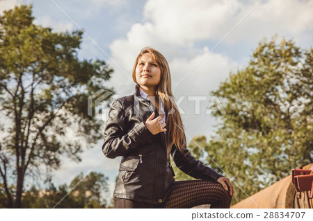 Asian girl in leather jacket 28834707
