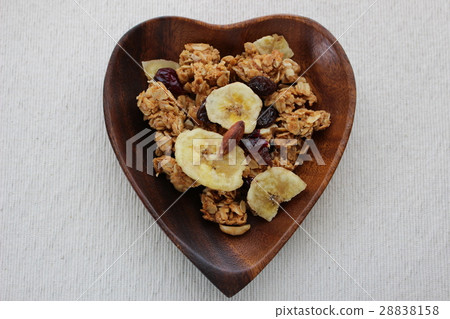 Heart shaped wooden container and granola Heart shaped wooden container and granola 28838158