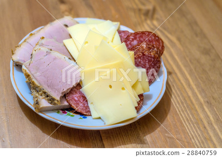 Variety of cheese and sausage 28840759