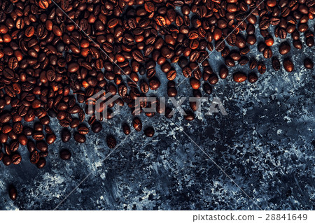 Coffee beans on a dark background of a concrete 28841649