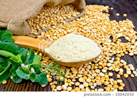 Flour pea in spoon on board 28842050