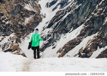 Man with backpack trekking in mountains. Man with backpack trekking in mountains. 28842430