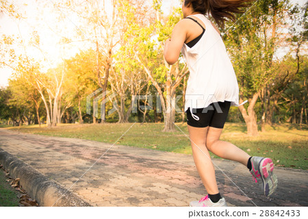 Young woman running training and exercising. Young woman running training and exercising. 28842433