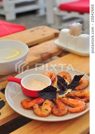 king prawns grilled with a creamy garlic sauce king prawns grilled with a creamy garlic sauce 28842668