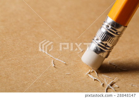 A pencil eraser removing a written mistake on a 28848147