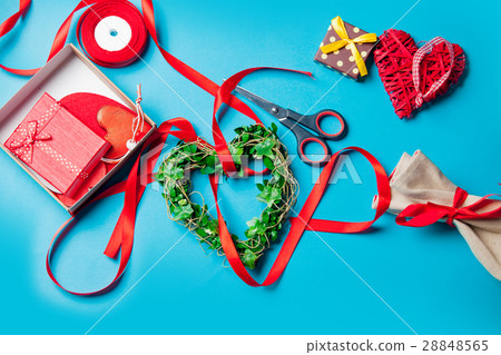 gifts, heart shaped toys lying near things for decoration on the gifts, heart shaped toys lying near things for decoration on the 28848565