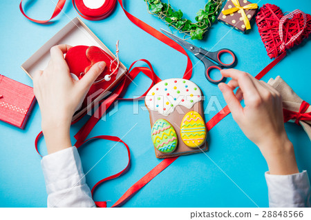 white caucasian female hands holding heart shaped toy near thing white caucasian female hands holding heart shaped toy near thing 28848566