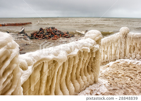 ice covered staircase on the beach 28848839