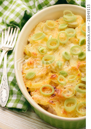 Casserole with chicken, potatoes, leek and cheese. Casserole with chicken, potatoes, leek and cheese. 28849115