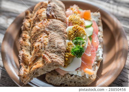 Sandwich with salmon, avocado and eggs Sandwich with salmon, avocado and eggs 28850456