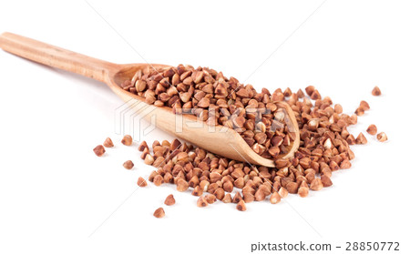 buckwheat in the wooden scoop isolated on white 28850772