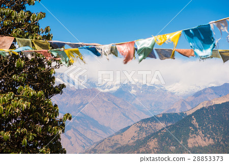 color prayer flags on the mountain in Nepal color prayer flags on the mountain in Nepal 28853373