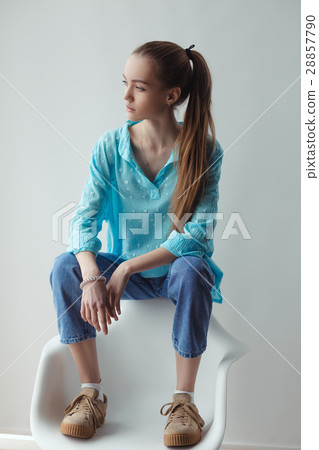 Confident stylish urban young woman looking away Confident stylish urban young woman looking away 28857790